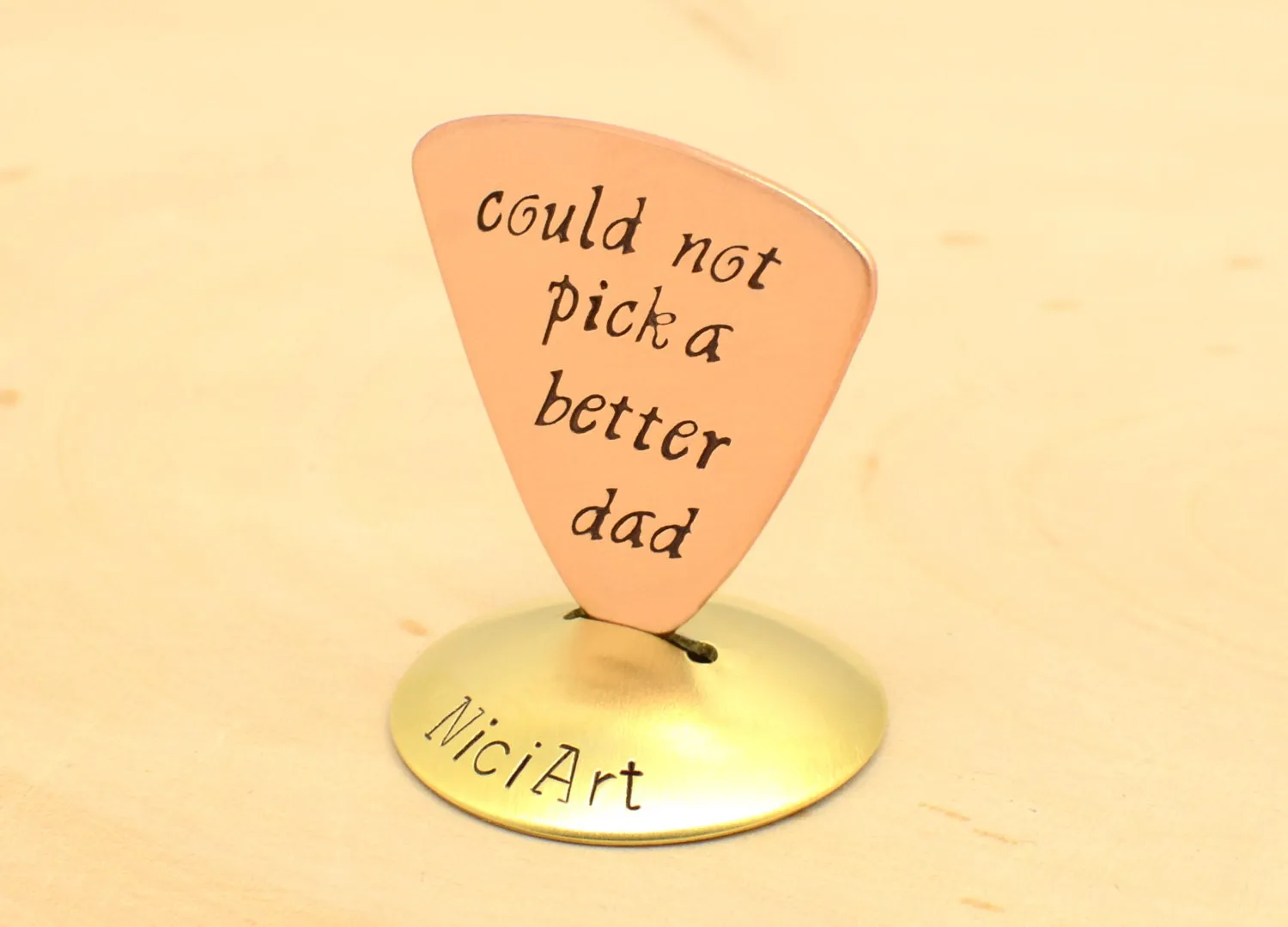 Copper Triangular Guitar Pick stamped with Couldn't Pick a Better Dad