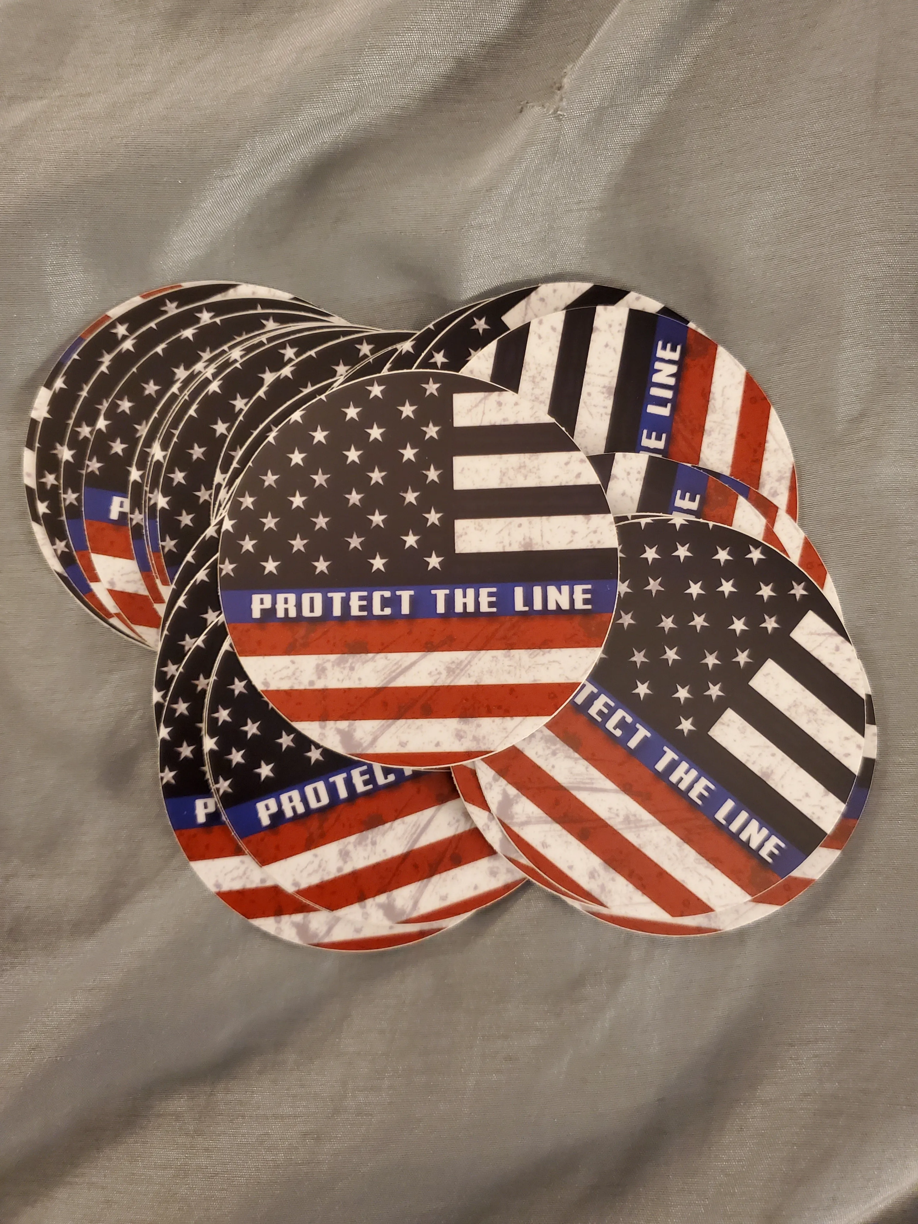 Protect the Line Round Stickers